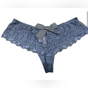 Victoria secret blue Lacy thong with a bow.